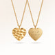 Personalized heart-shaped gold necklace with rippled wave surface and space for engraving of text, coordinates or handwriting on the back