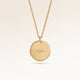 Personalized round gold necklace with space for engraving of text, coordinates or handwriting on the front and back